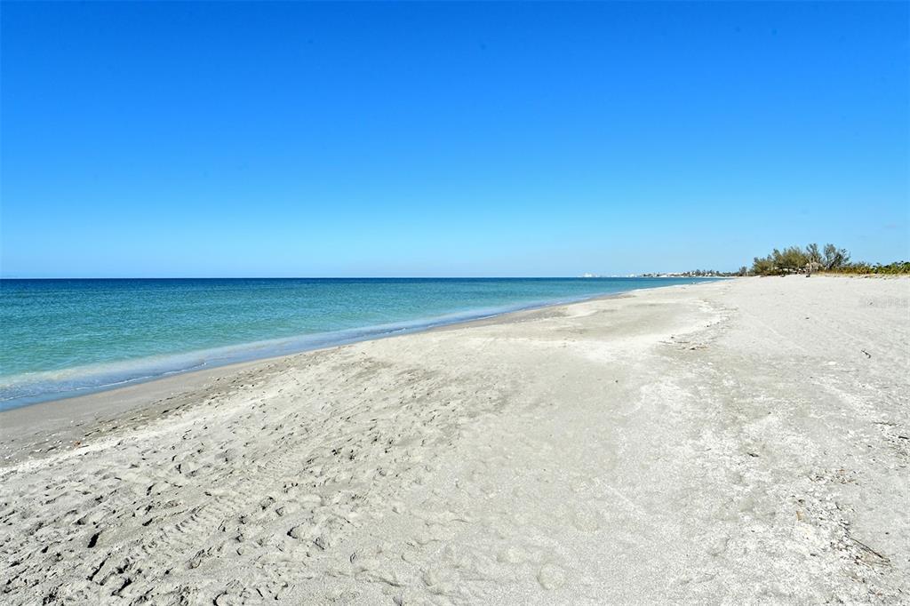 8764 Midnight Pass Road, Unit A306 Sarasota, FL 34242 - Photo 28 of 53 a view of an ocean beach