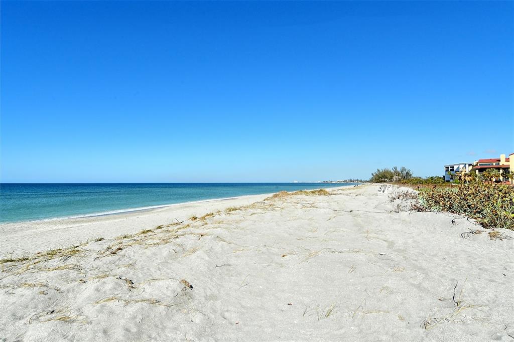 8764 Midnight Pass Road, Unit A306 Sarasota, FL 34242 - Photo 29 of 53 a view of beach and an ocean