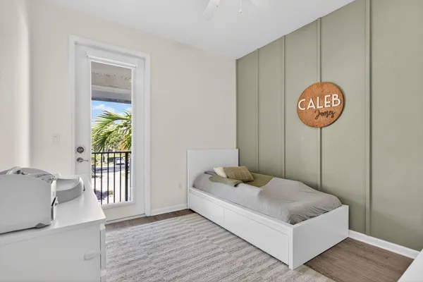 a bedroom with a bed and a table