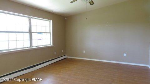 1073 State Road Effort, PA 18330 - Photo 6 of 10 an empty room with a window