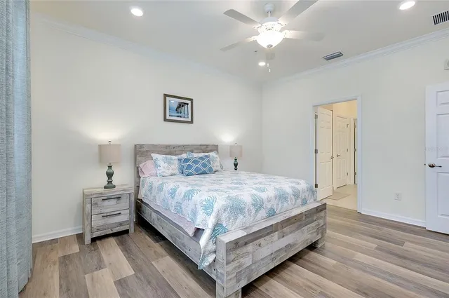 a bathroom with a glass shower door and a shower