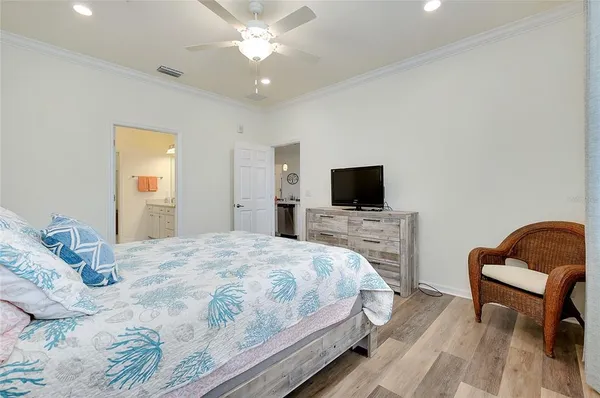 a bathroom with a glass shower door and a glass door
