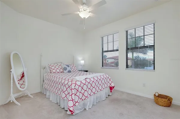 a bathroom with a shower curtain and sink