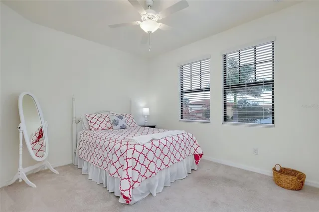 a bathroom with a shower curtain and sink