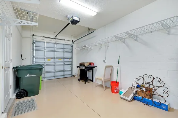 a view of a swimming pool and lounge chair