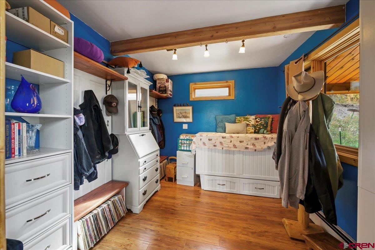 87 Which Way Ridgway, CO 81432 - Photo 32 of 45 a view of walk in closet with clothes and shoes