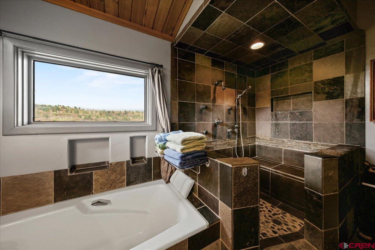 87 Which Way Ridgway, CO 81432 - Photo 39 of 45 a room with table chairs and windows