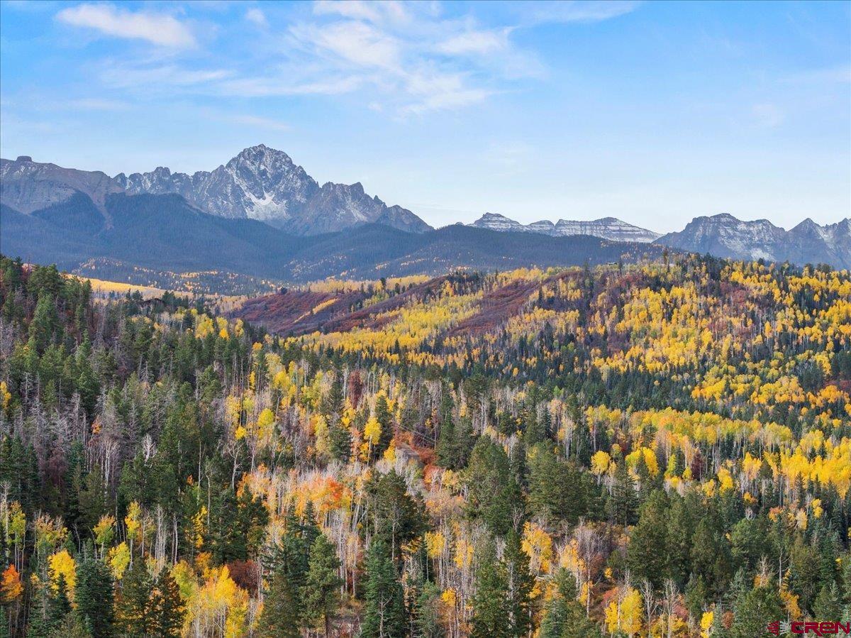 87 Which Way Ridgway, CO 81432 - Photo 5 of 45 a view of a city with mountains in the background