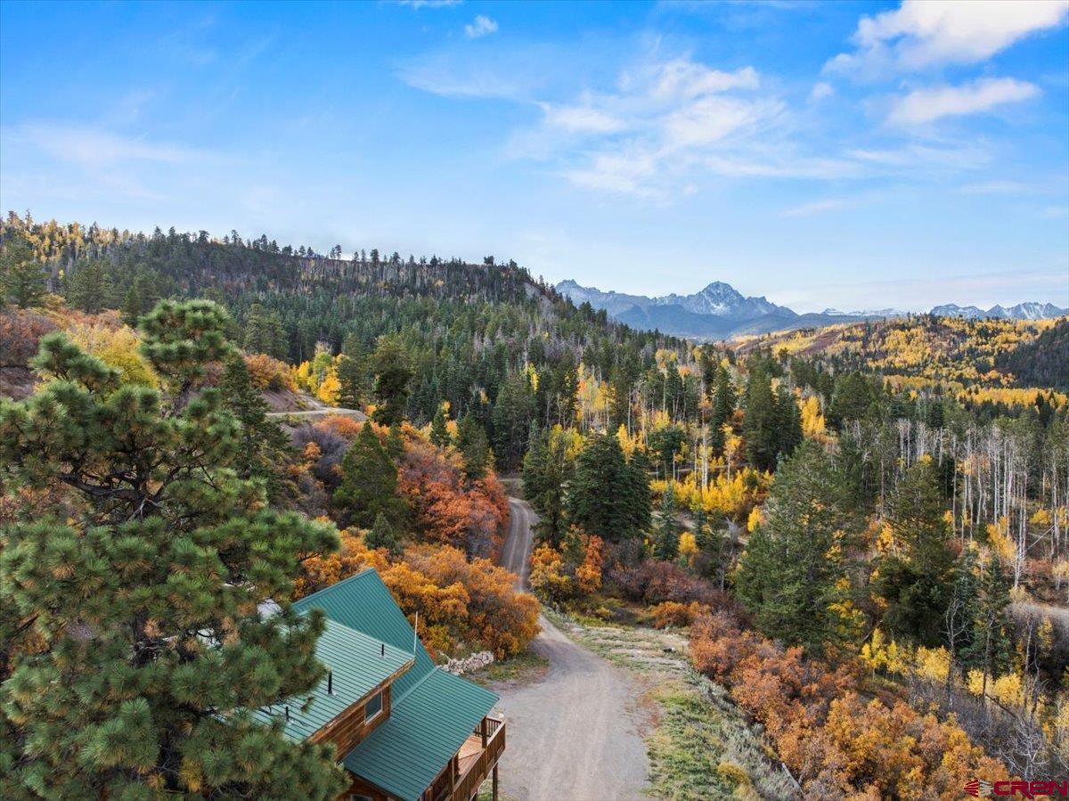 87 Which Way Ridgway, CO 81432 - Photo 7 of 45 a view of a city with mountains in the background