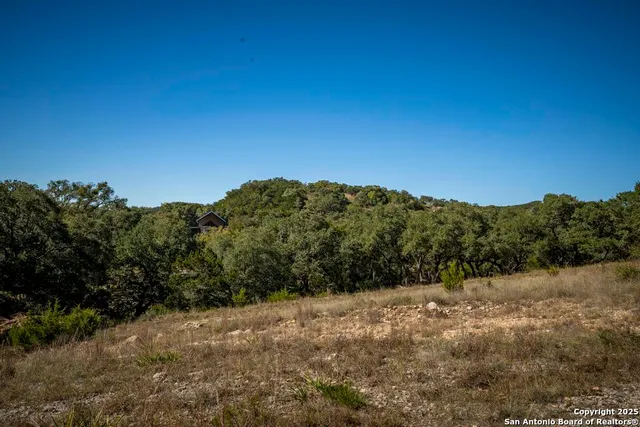 a view of a mountain range with a mountain in the background