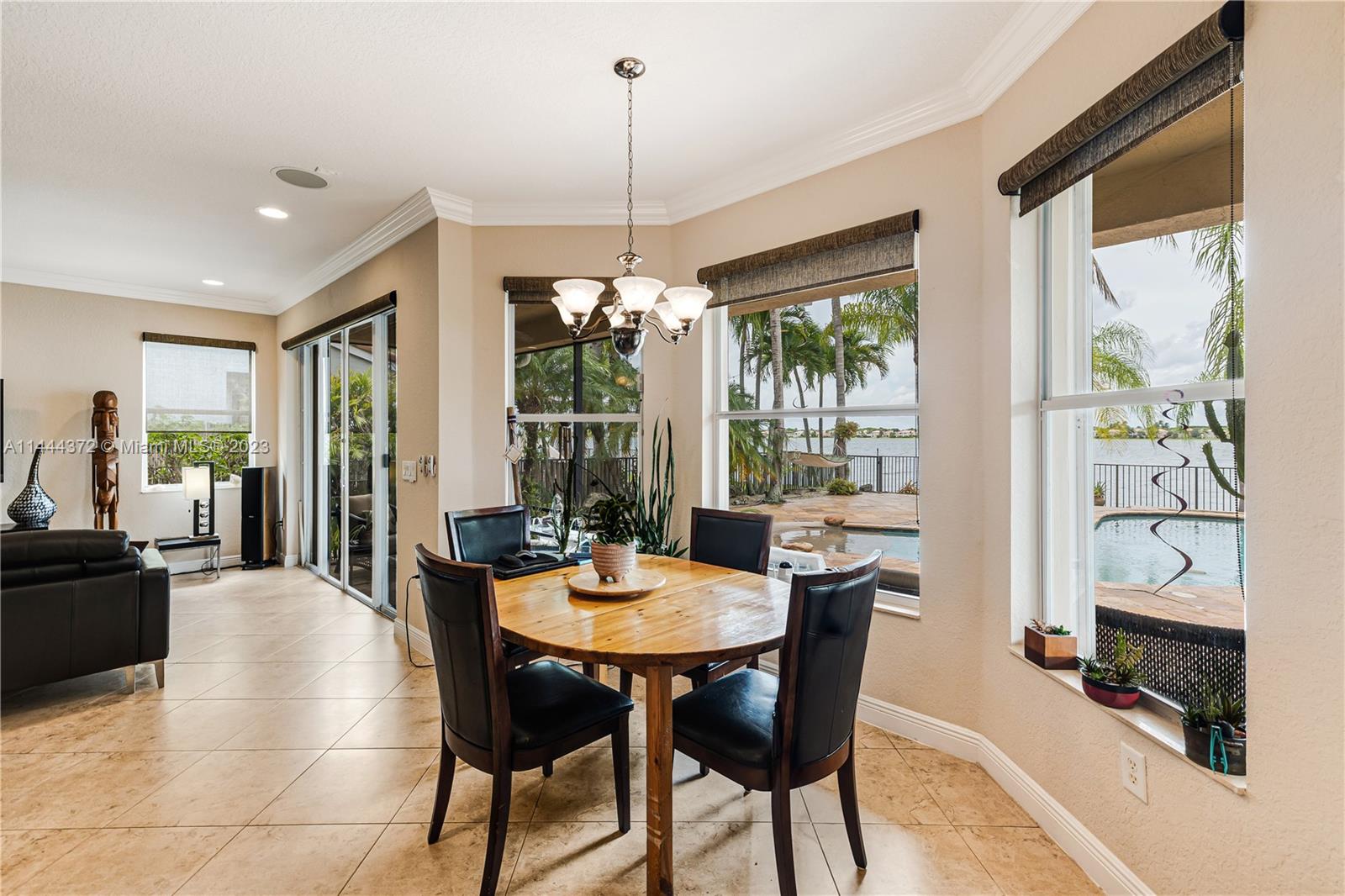 4546 Southwest 179th Way Miramar, FL 33029 - Photo 14 of 55 a dining room with furniture window wooden floor