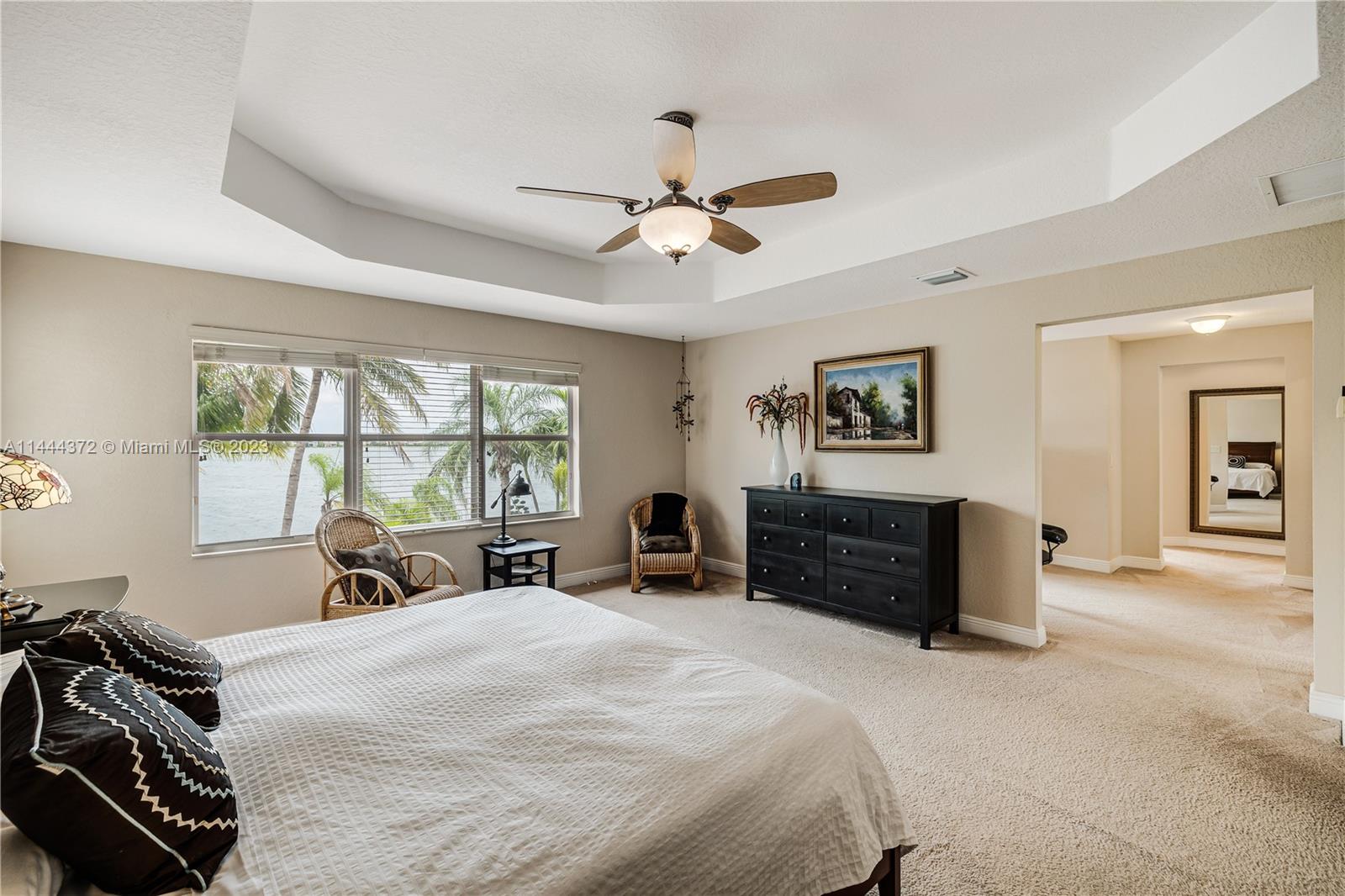 4546 Southwest 179th Way Miramar, FL 33029 - Photo 26 of 55 a bed room with a bed and a large window