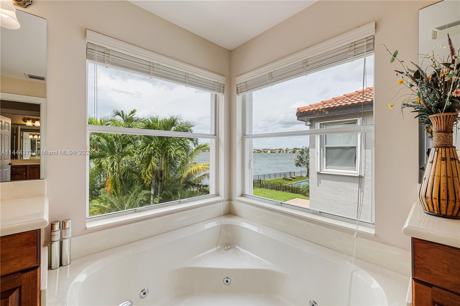 4546 Southwest 179th Way Miramar, FL 33029 - Photo 32 of 55 a view of a large window with a garden view