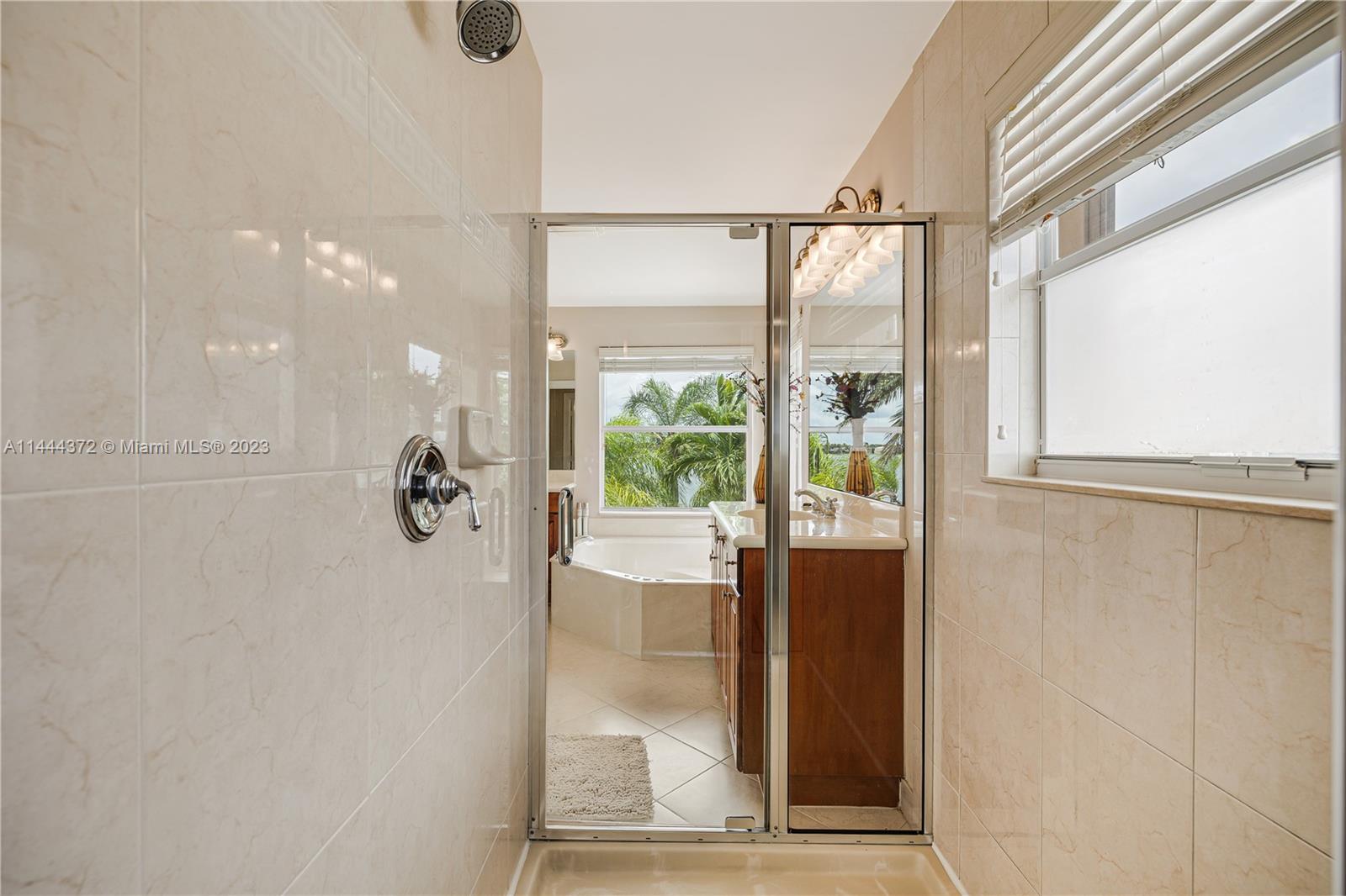 4546 Southwest 179th Way Miramar, FL 33029 - Photo 34 of 55 a view of a glass door with a glass door
