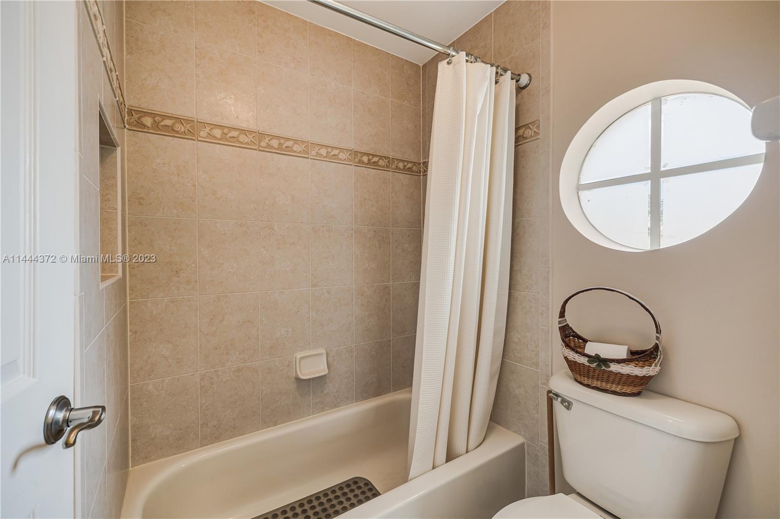4546 Southwest 179th Way Miramar, FL 33029 - Photo 38 of 55 a bathroom with a granite countertop bathtub shower sink and toilet