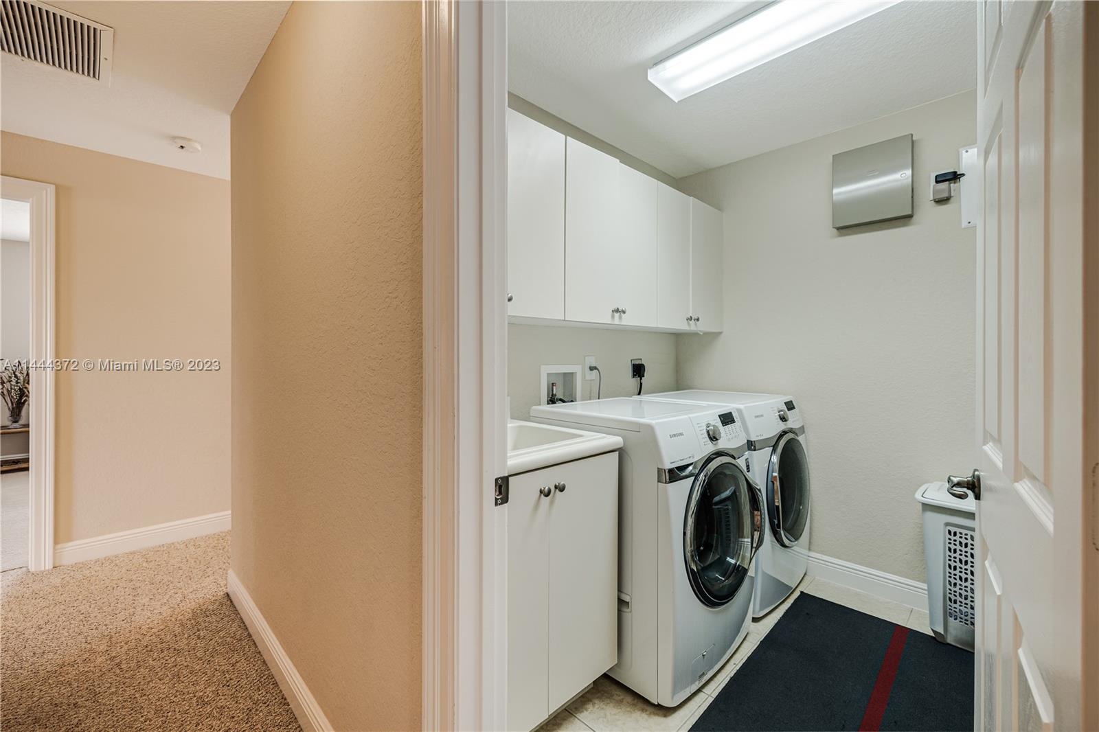 4546 Southwest 179th Way Miramar, FL 33029 - Photo 40 of 55 a utility room with dryer and washer