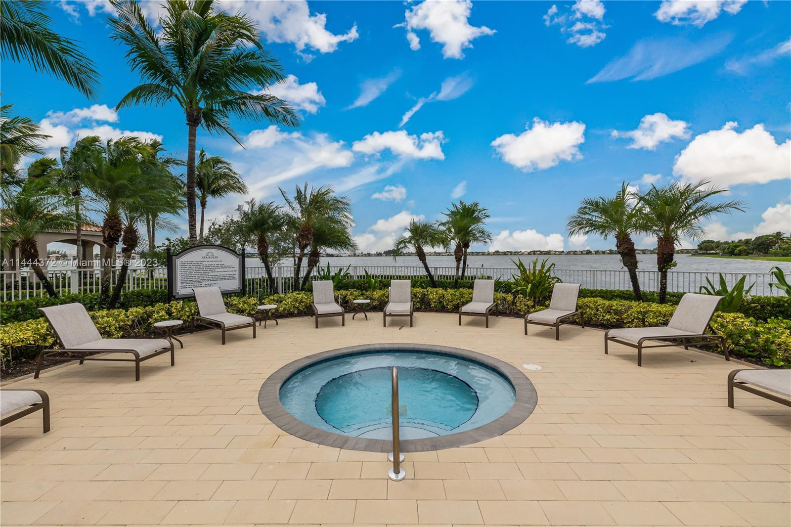 4546 Southwest 179th Way Miramar, FL 33029 - Photo 52 of 55 a view of a swimming pool with outdoor seating