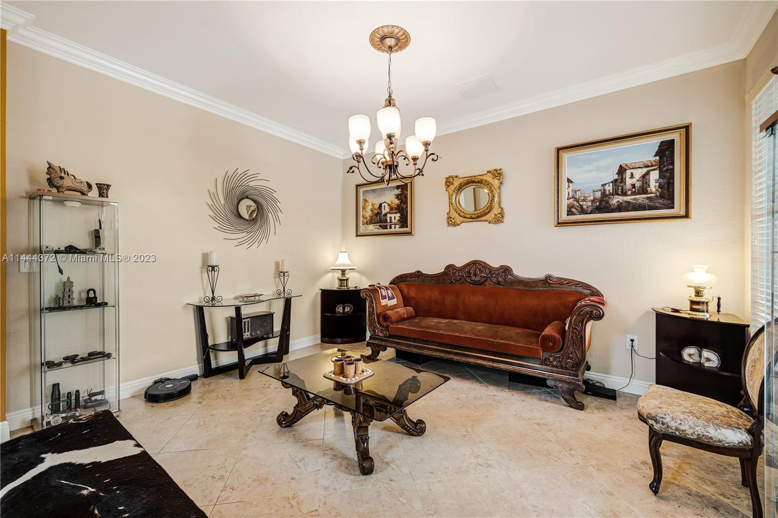 4546 Southwest 179th Way Miramar, FL 33029 - Photo 7 of 55 a living room with furniture piano and a chandelier
