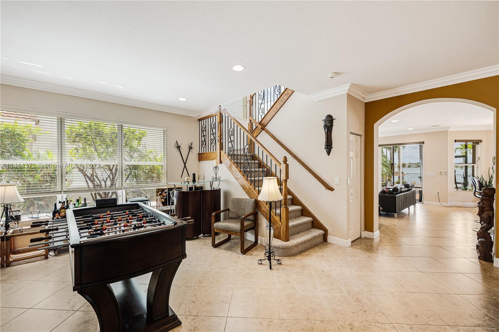 4546 Southwest 179th Way Miramar, FL 33029 - Photo 9 of 55 a view of a livingroom with furniture and staircase