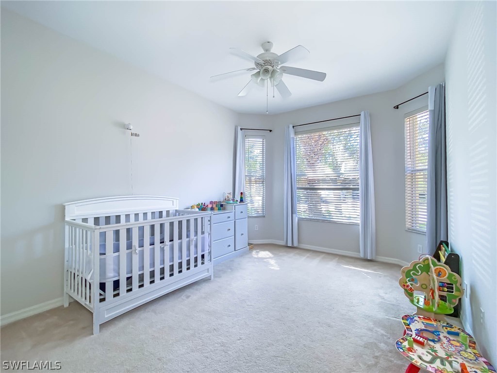 20599 Ardore Lane Estero, FL 33928 - Photo 23 of 29 a view of a livingroom with furniture and hardwood floor