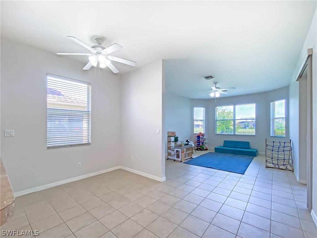 20599 Ardore Lane Estero, FL 33928 - Photo 7 of 29 a view of a room window and wooden floor