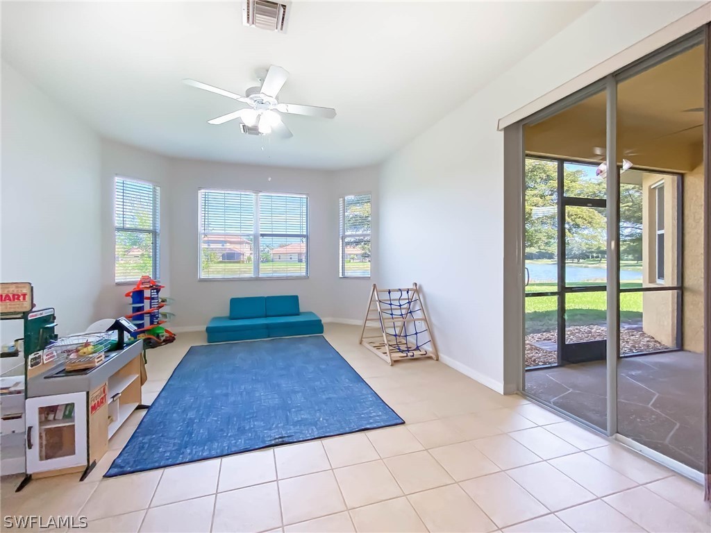 20599 Ardore Lane Estero, FL 33928 - Photo 8 of 29 a very nice looking room with a large window