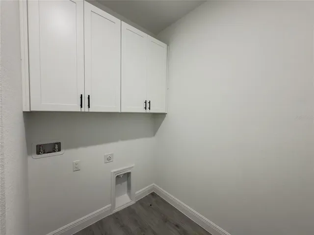 a view of an empty room with a garage