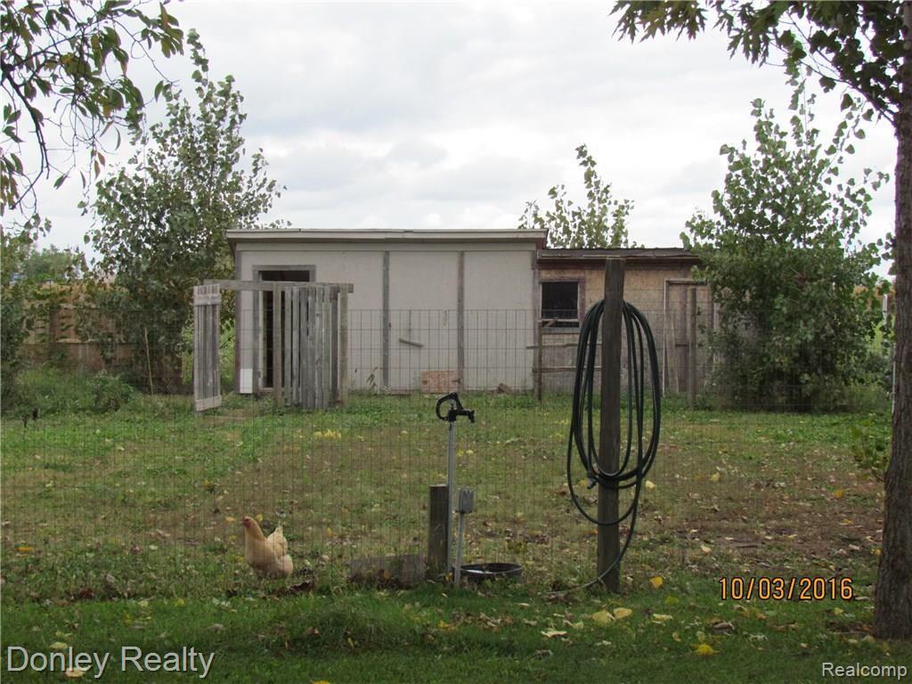 7961 Sanilac Road Kingston, MI 48741 - Photo 30 of 38 chicken coop with water and electric