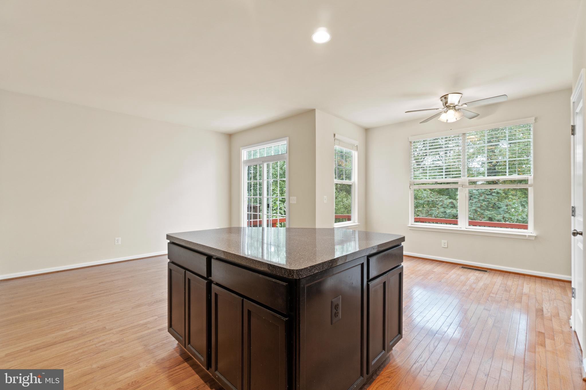 204 Short Branch Road Stafford, VA 22556 - Photo 8 of 35 Kitchen island with view of breakfast nook