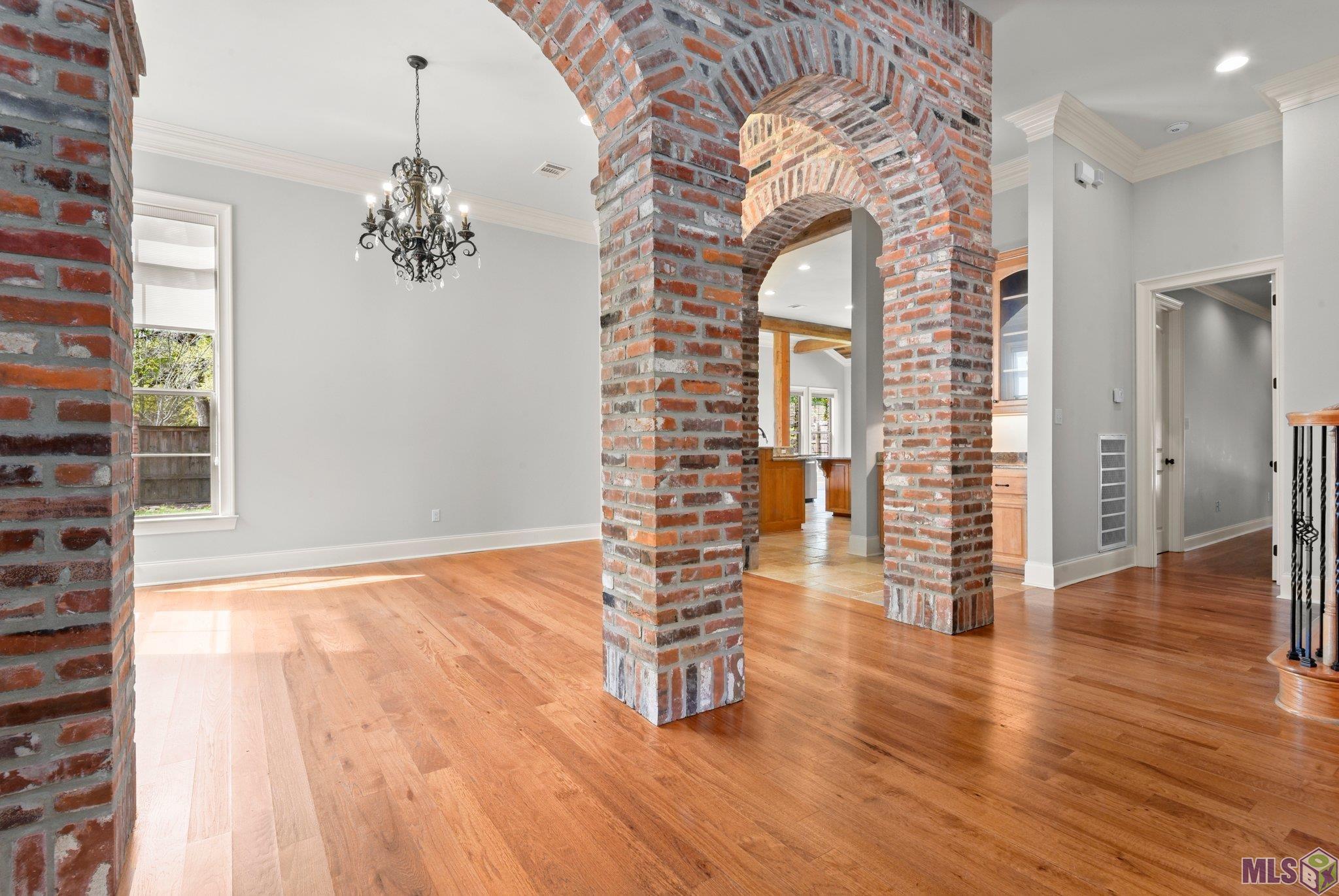 9826 Myrtle Lane Baton Rouge, LA 70810 - Photo 7 of 31 Dining with Brick Arches