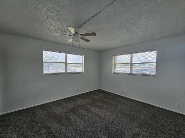 7910 North Colony Circle, Unit 301 Tamarac, FL 33321 - Photo 4 of 5 a view of an empty room with a window