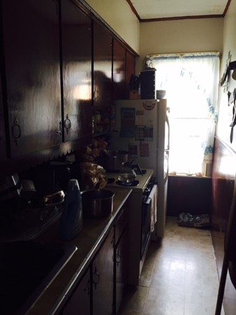 303 Cambridge Street Fall River, MA 02721 - Photo 8 of 13 a kitchen with a large stove and cabinets