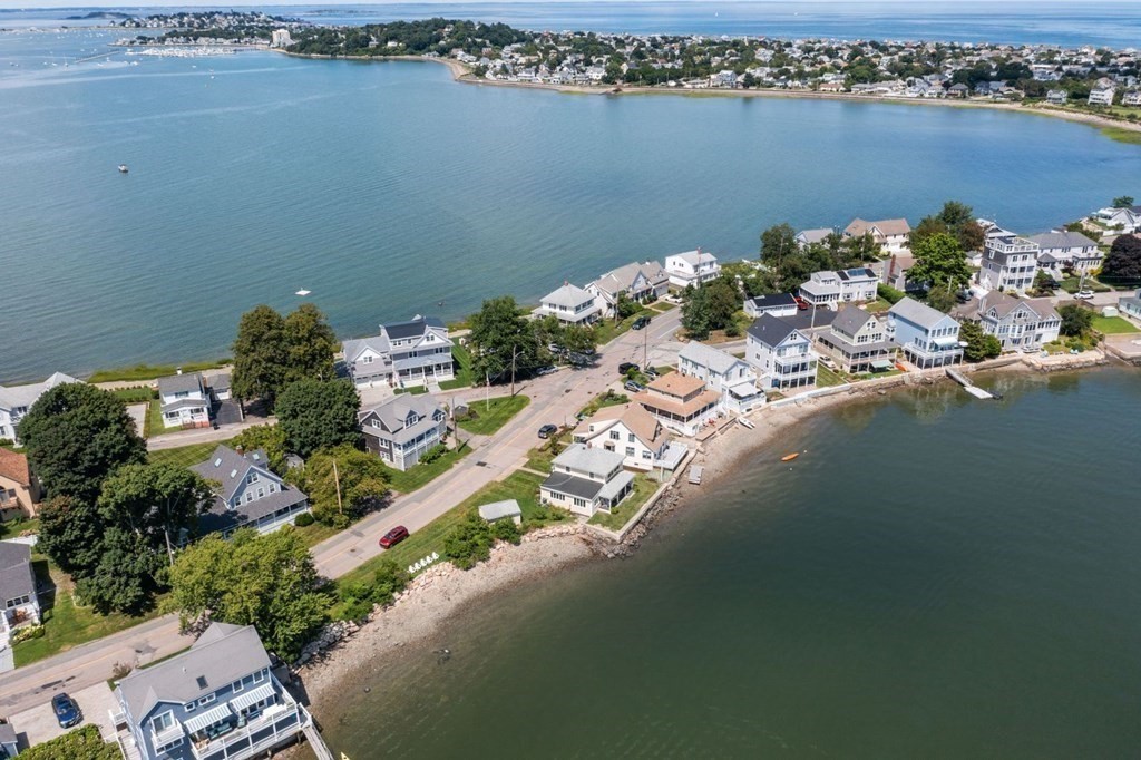 225 Nantasket Road Hull, MA 02045 - Photo 1 of 40 a view of a lake with a city