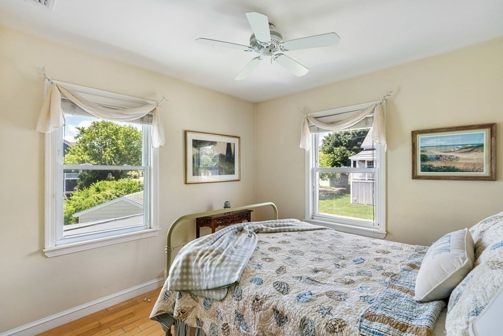 225 Nantasket Road Hull, MA 02045 - Photo 27 of 40 a bedroom with a bed and a window