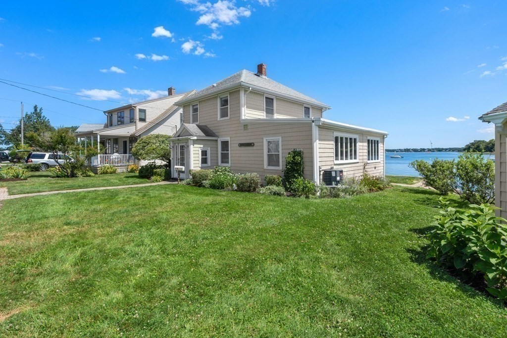 225 Nantasket Road Hull, MA 02045 - Photo 32 of 40 a front view of a house with a yard