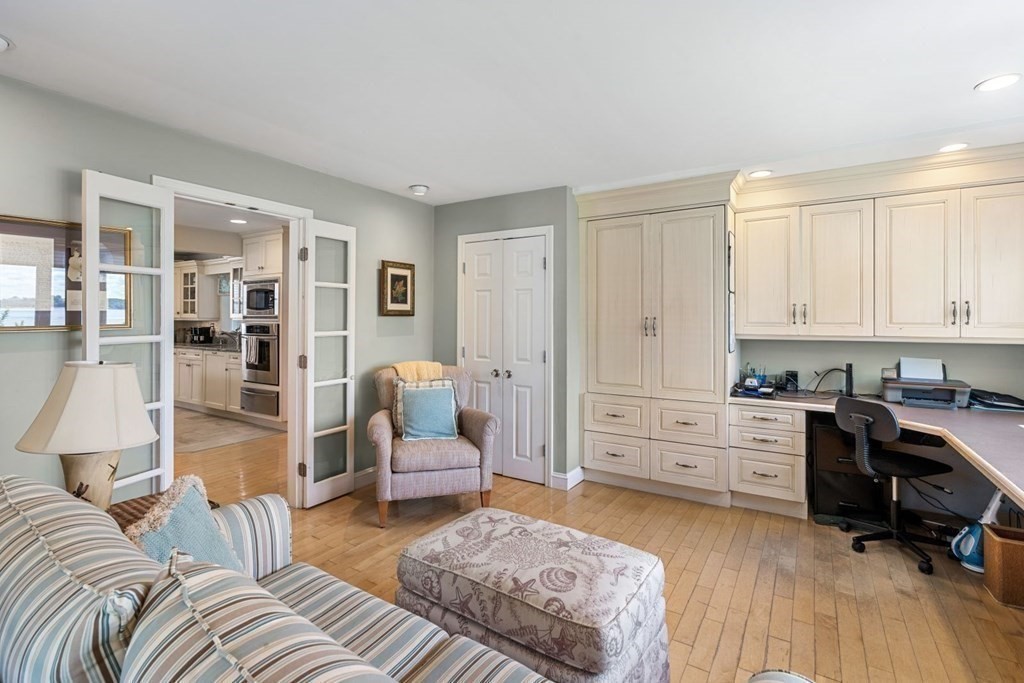 225 Nantasket Road Hull, MA 02045 - Photo 10 of 40 a bedroom with furniture and a wooden floor