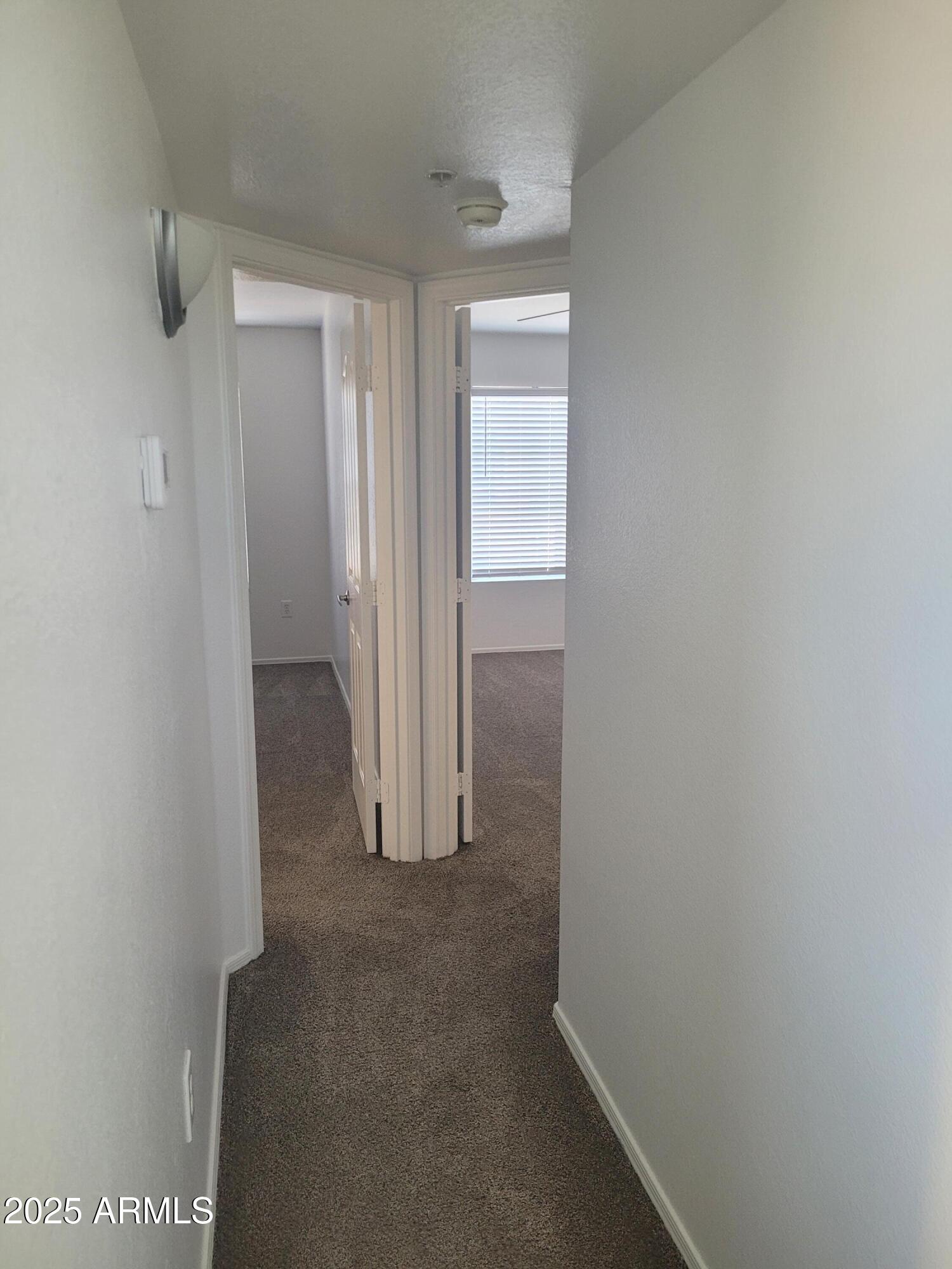 280 South Evergreen Road, Unit 1312 Tempe, AZ 85288 - Photo 14 of 25 a view of hallway with closet