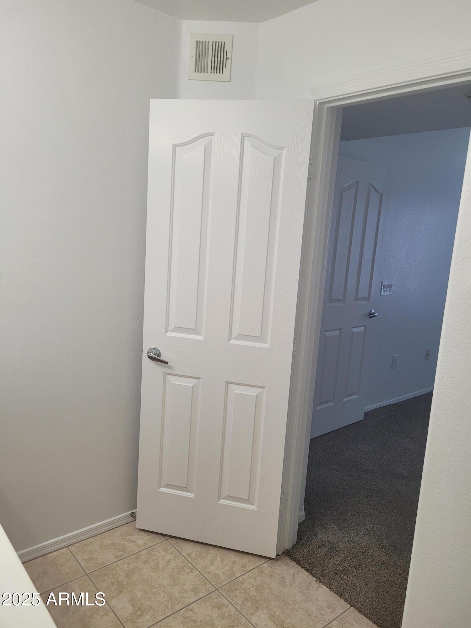280 South Evergreen Road, Unit 1312 Tempe, AZ 85288 - Photo 16 of 25 an empty room with closet area