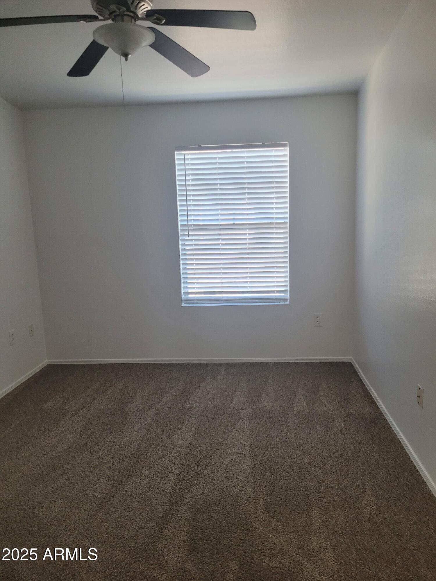 280 South Evergreen Road, Unit 1312 Tempe, AZ 85288 - Photo 19 of 25 an empty room with a window
