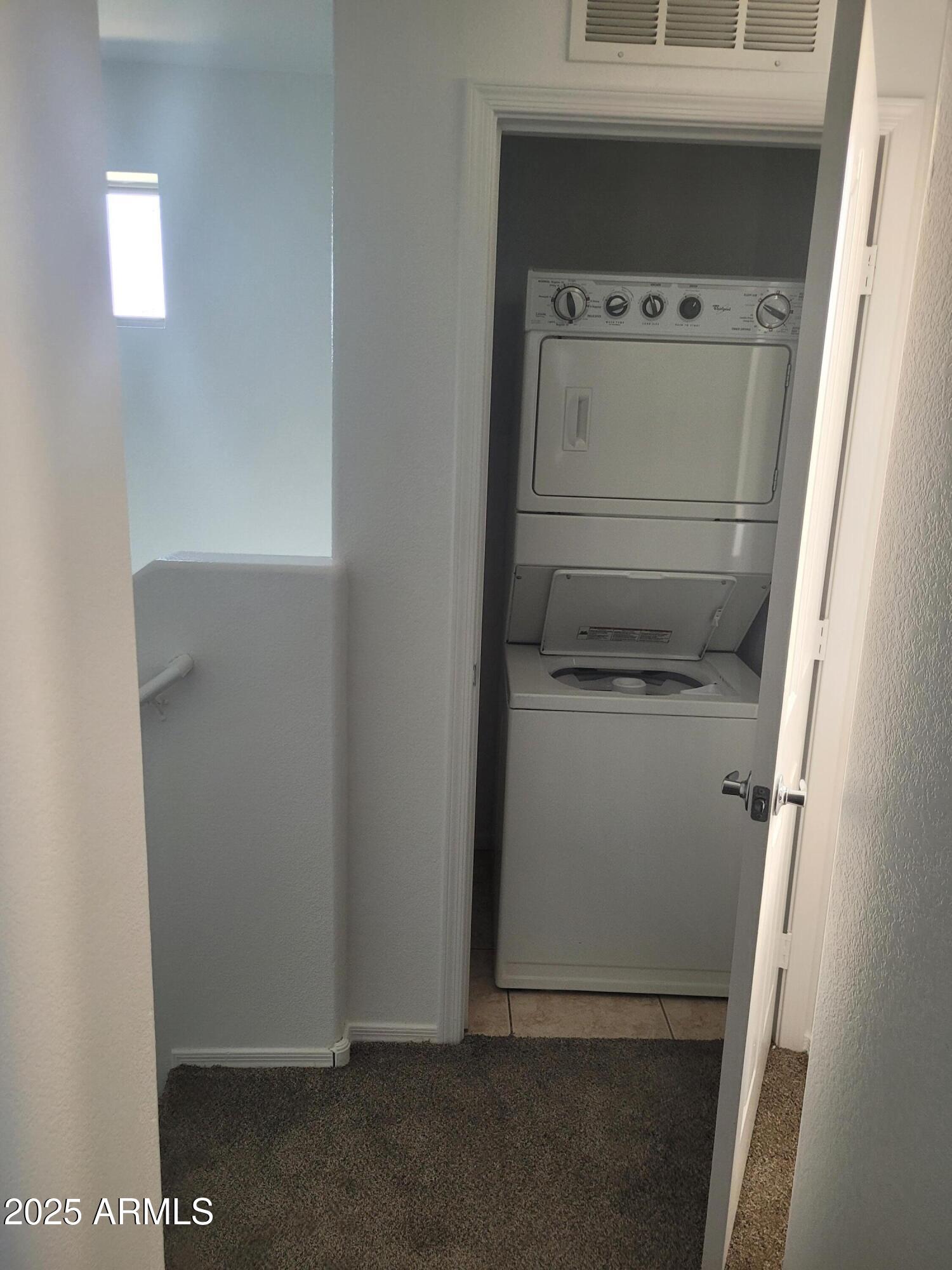 280 South Evergreen Road, Unit 1312 Tempe, AZ 85288 - Photo 23 of 25 a utility room with dryer and washer