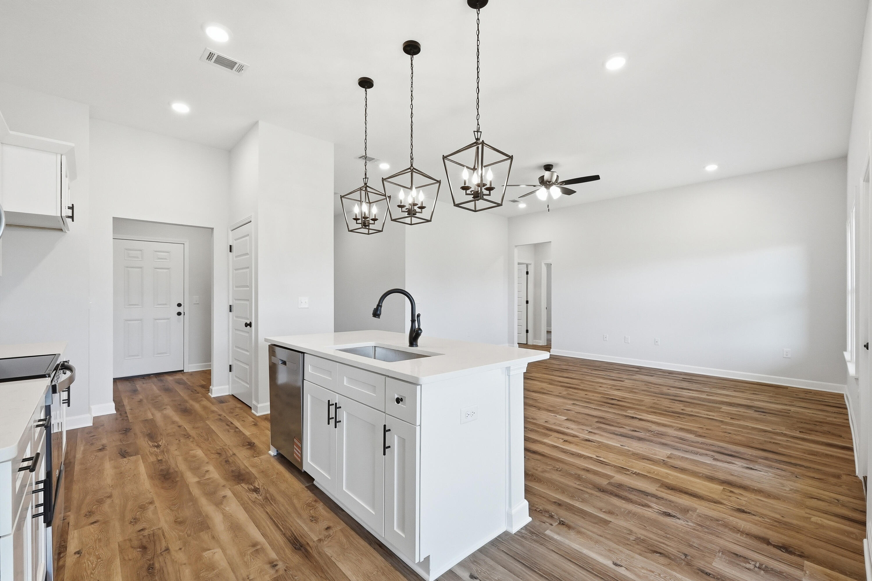 2801 Blackbird Court Crestview, FL 32539 - Photo 12 of 26 a very nice looking room with wooden floor