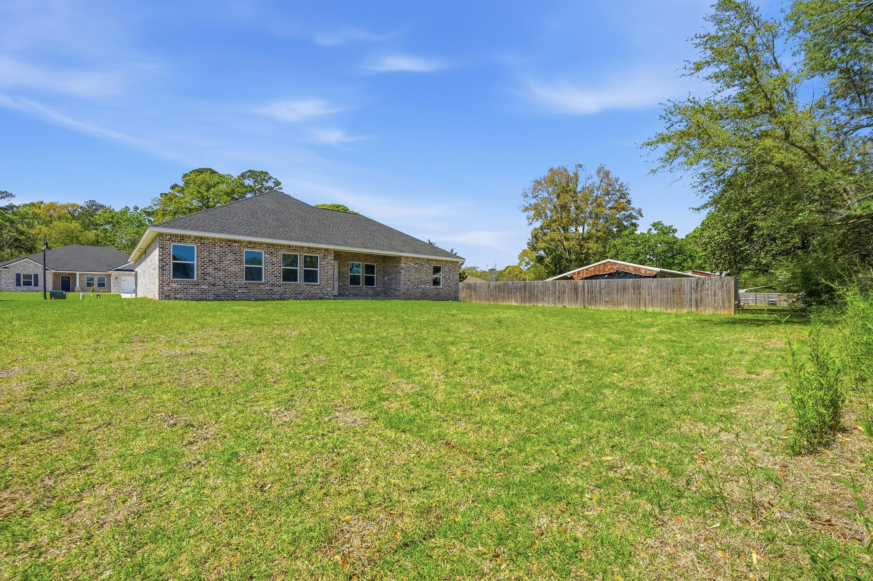 2801 Blackbird Court Crestview, FL 32539 - Photo 24 of 26 a view of a house with a big yard