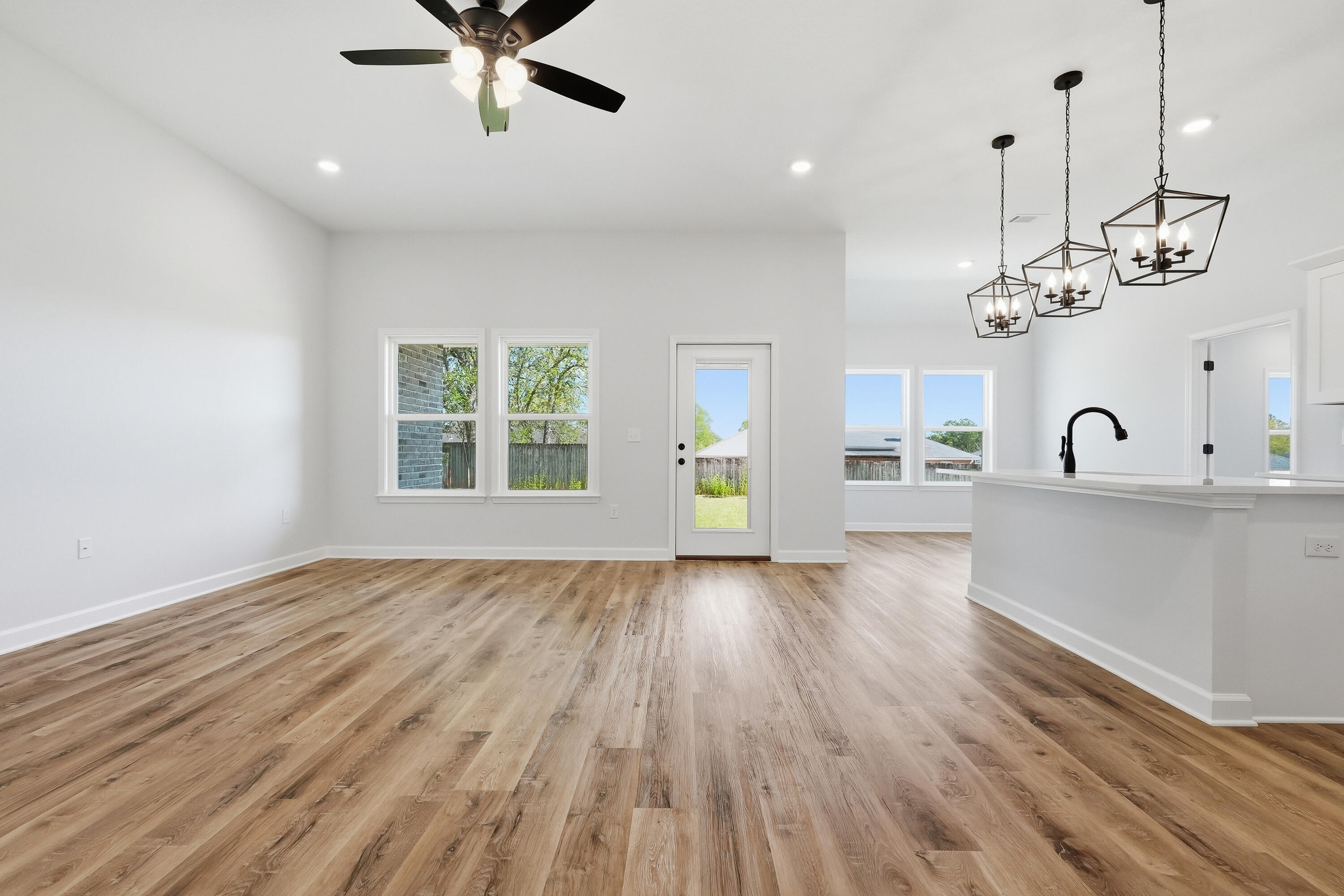 2801 Blackbird Court Crestview, FL 32539 - Photo 4 of 26 a view of a kitchen with sink and wooden floor
