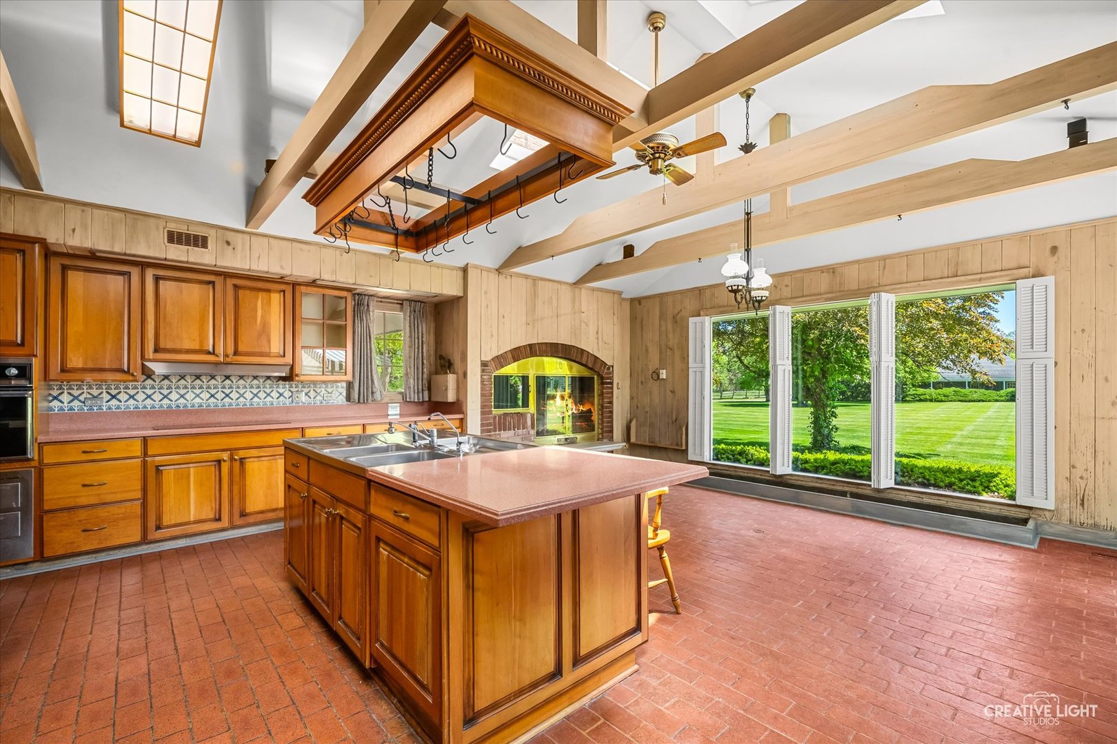 33W451 Surrey Road Wayne, IL 60184 - Photo 24 of 41 a kitchen with sink and large windows
