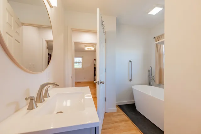 a view of a pathway with a yard