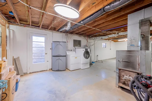 a bathroom with a toilet a sink and a bathtub