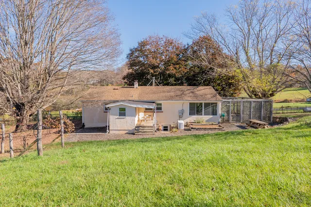 an aerial view of lake residential house and outdoor space