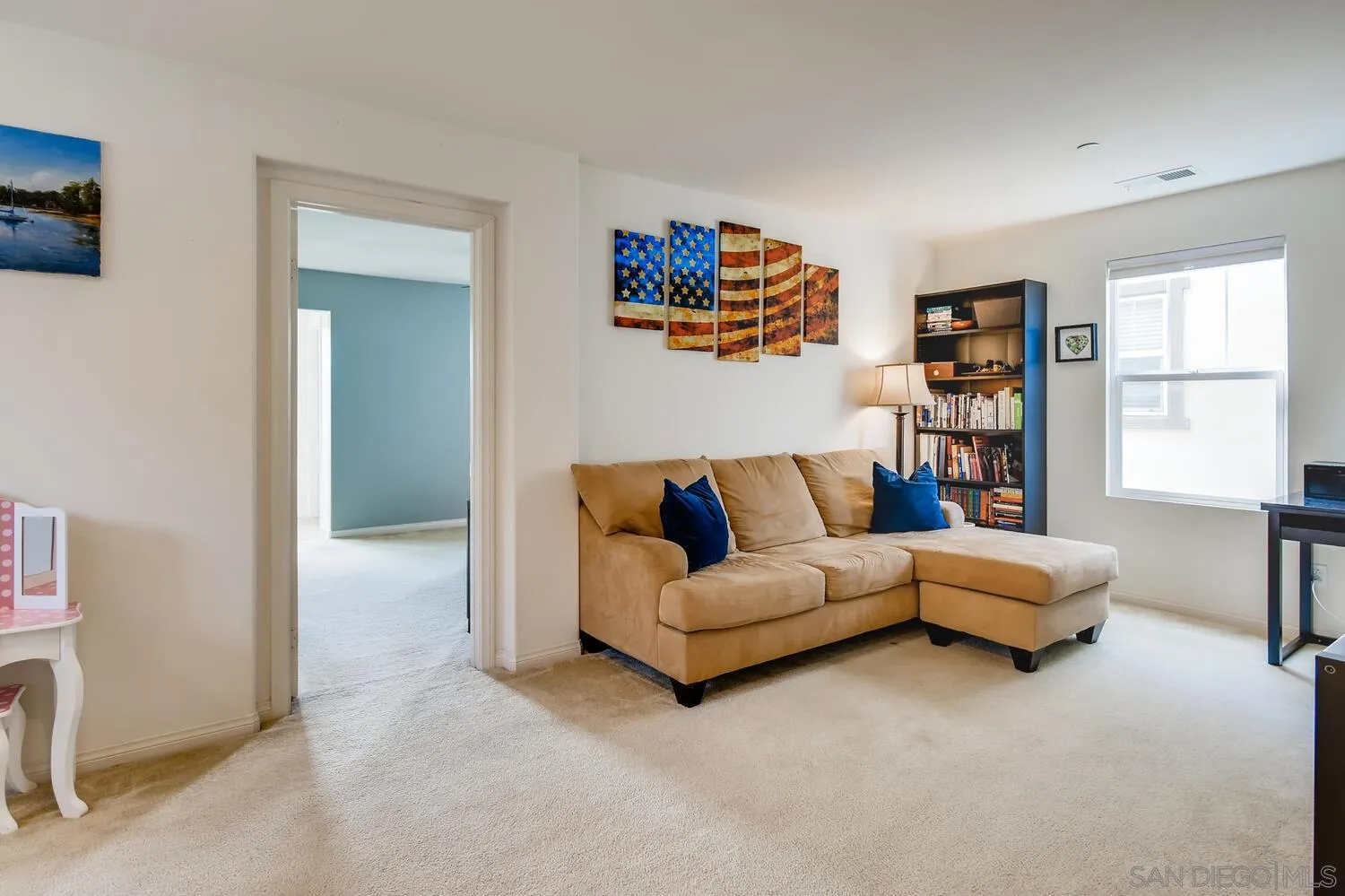 1223 Mason Road Chula Vista, CA 91913 - Photo 12 of 24 a living room with furniture and a window