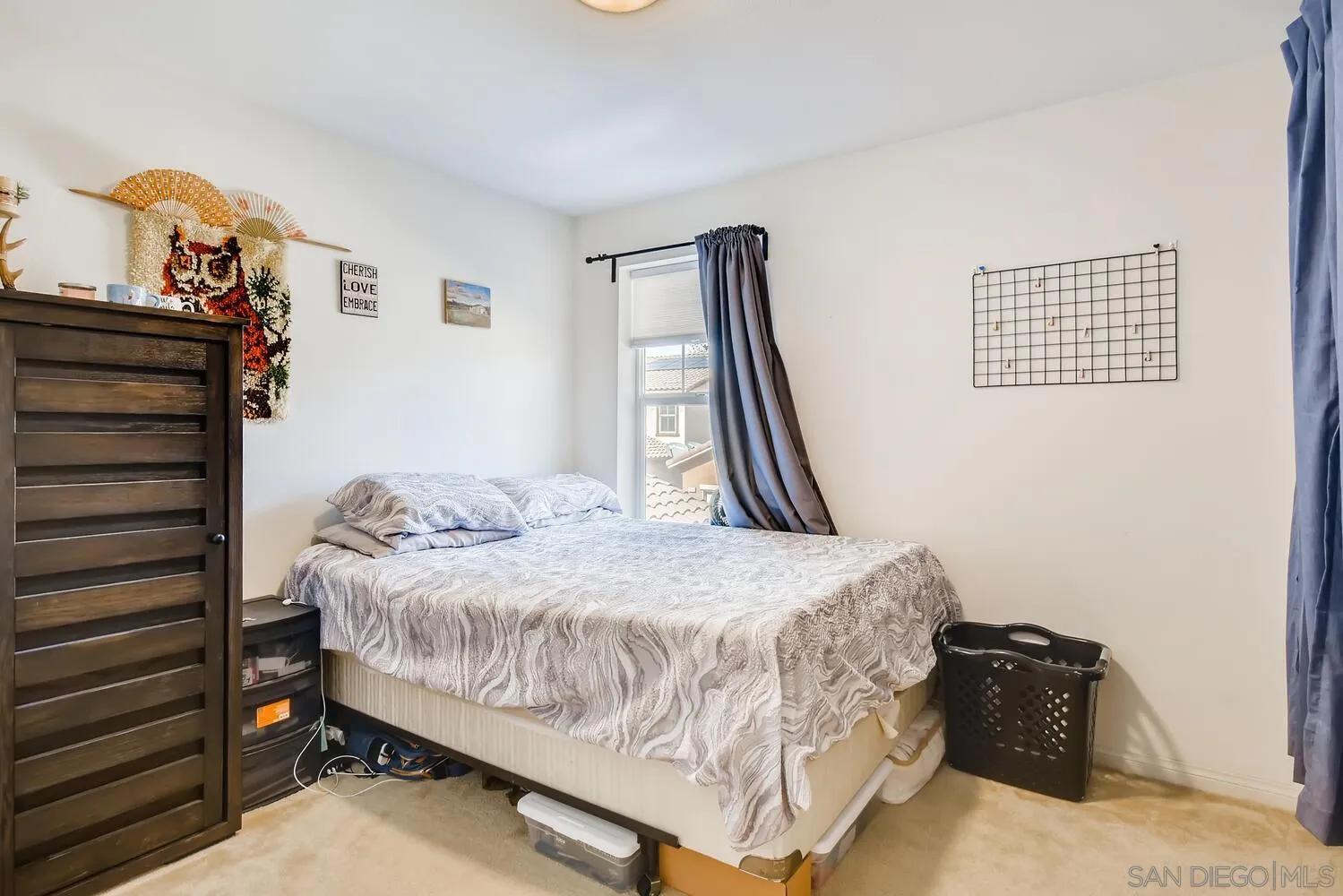 1223 Mason Road Chula Vista, CA 91913 - Photo 16 of 24 a bedroom with a bed and wooden floor