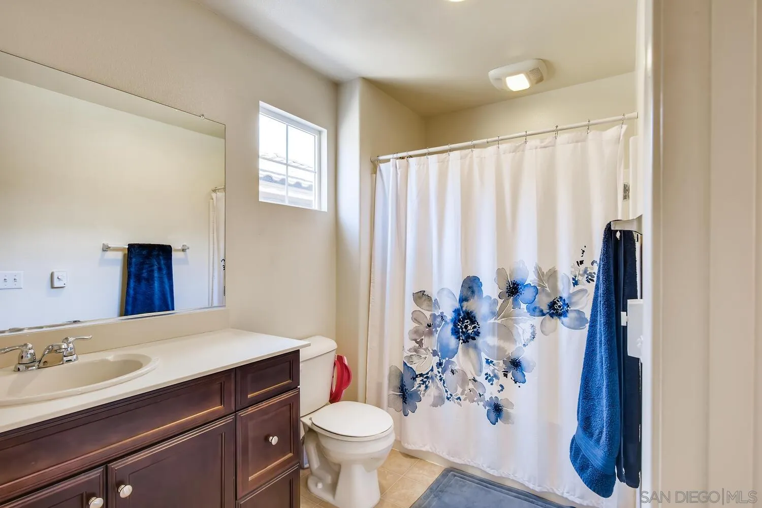 1223 Mason Road Chula Vista, CA 91913 - Photo 19 of 24 a bathroom with a sink toilet and shower